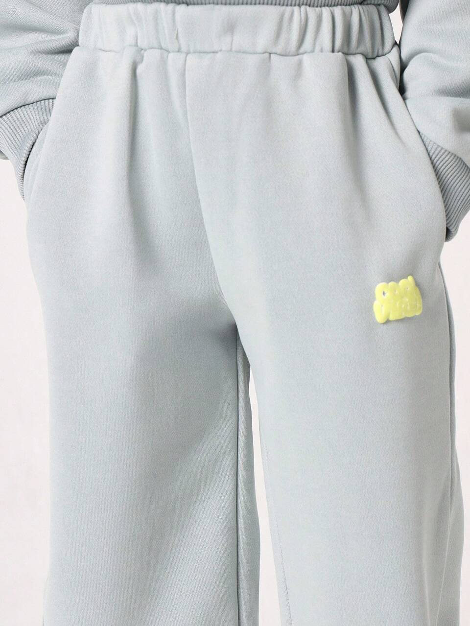 Felpa girocollo con elastico in vita e pantaloni da jogging
