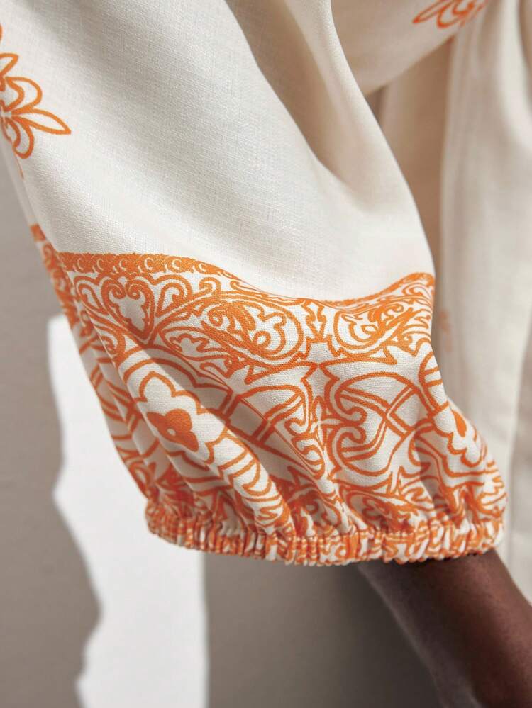 SHEIN Maija Women's Floral Print V-Neck Fringe Trim Relaxed Fit 3/4 Sleeve Blouse With Oversized Hem, Versatile For Urban Commute, Business, Casual, Beach, Boho Festival, Christmas, New Year Party