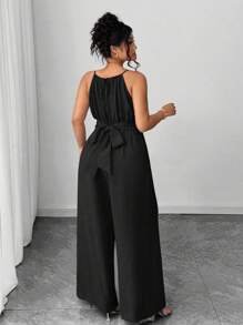 Rometta Plus Size Women's Casual Pleated Fabric Spaghetti Strap Beaded Waist Button & Bowknot Design Black Jumpsuit, Suitable For Spring/Summer, Back To School, Graduation, Valentine's Day, Music Festival, Mother's Day, Halloween, Thanksgiving, Easter, National Day, Prom, Date Party, Wedding, Outdoor Trips