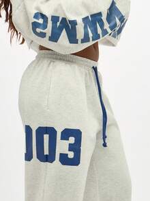 SUMWON WOMEN Pantalon de jogging ample avec numéros de varsité d'université, jambes larges, coupe ample, chaud pour l'hiver, ample et confortable, mode streetwear, graphiques numéro 003