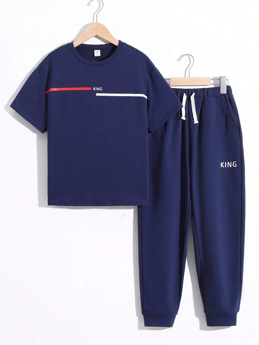 若い男性用 カジュアル&シンプルなレタープリント 半袖Tシャツ パンツセット 2点、ゆったりとした着心地で、外出、学校、バケーション、パーティー、スポーツ、春夏に最適 - ロイヤルブルー - チェックする 1