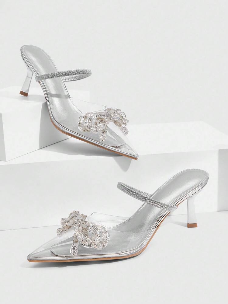 CUCCOO SZL Tacones altos para mujer, sandalias mule plateadas transparentes con tacón de aguja, hebilla de metal con pedrería de rhinestone, puntera puntiaguda, tacón de aguja sexy
