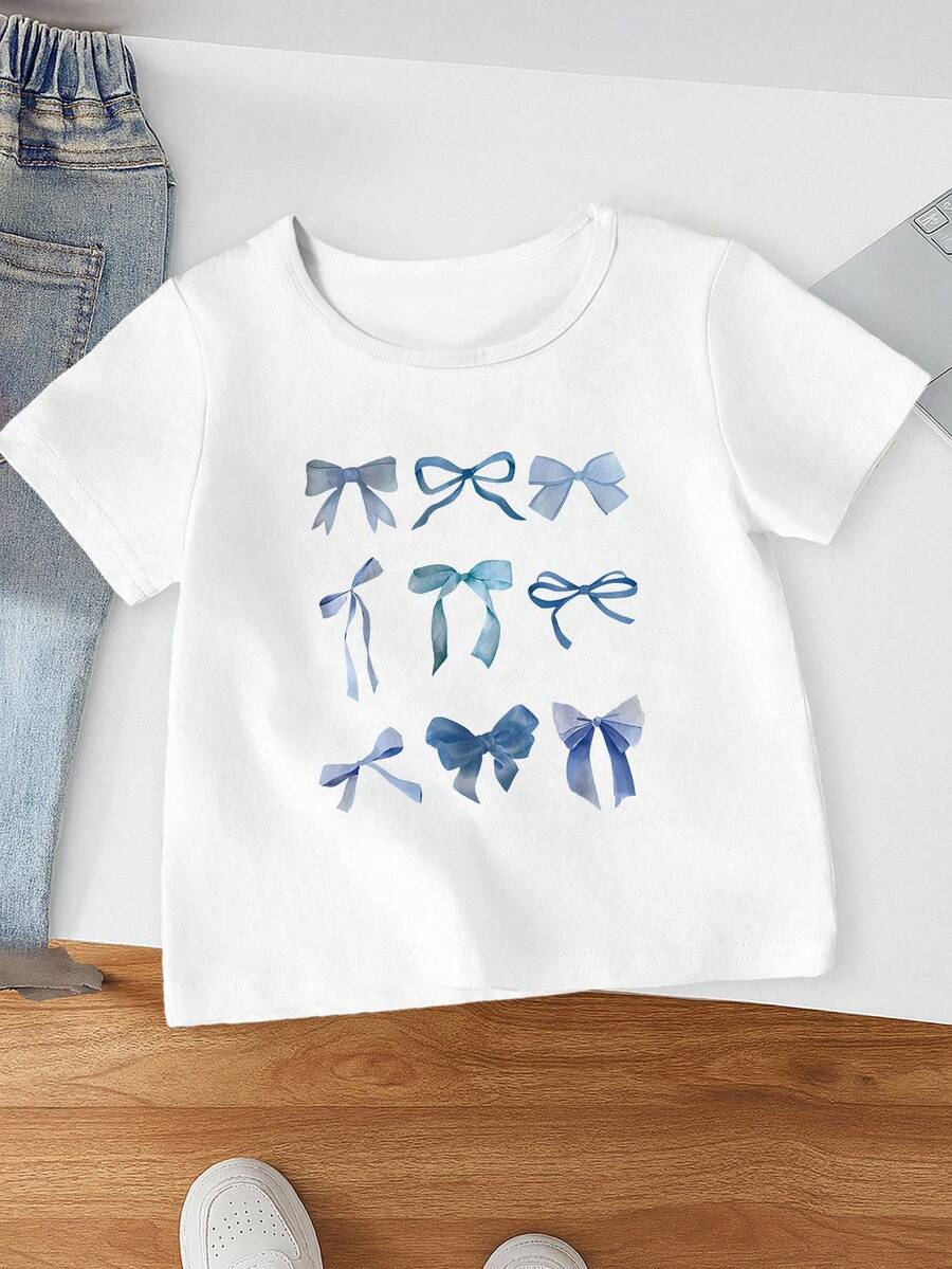 SHEIN Áo thun in hình nơ xanh tay ngắn cho bé gái tuổi teen sáng tạo và thẩm mỹ, phù hợp cho các buổi đi chơi và tạo phong cách dễ thương cho bé gái tuổi teen, mùa hè - trắng - Xem 1