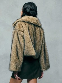 TypaGal Stand Out In Style With This Ash Brown Faux Fur Zip-Up Jacket, A Bold Option For Winter Jacket, Winter Coat, And Winter Clothes Women. Its Boxy, Modern Shape Is Ideal For Autumn Clothes And Perfectly Complements Fall Outfits For Women And Work Clothes Women. The Zip Detail Is A Nod To Button Up Shirt Women And Y2k Outfit Elements, While The Natural-Toned Fur Draws In Animal Print And Fairycore Influence For Alt And Goth Layering.