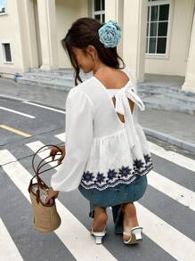 Serisse Áo nữ mùa thu thêu giả lanh, áo kiểu tay dài dáng đèn lồng thêu họa tiết, nơ sau lưng, áo hoa thêu phối màu tương phản với tay áo bồng bềnh, thích hợp cho kỳ nghỉ và đi chơi, áo ống lưới thêu, áo thêu đi biển, áo kiểu boho cho nữ, áo đi chơi, áo đi học, áo Halloween, áo giáo viên, áo công sở, áo dự tiệc, áo mùa đông, áo thường ngày, áo mùa xuân. - Nhiều màu - Xem 4