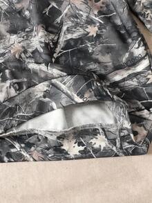 SHEIN بلوزة رياضية كاجوال فضفاضة للمراهقات بطبعة كاموفلاج أشجار وأغصان وطباعة شارع مع كابوشون