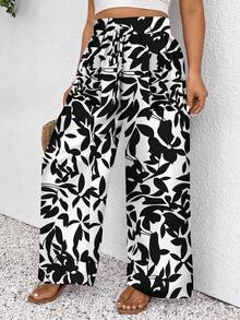 SHEIN Frenchy Pantalones sueltos casuales informales de talle alto con nudo, estilo de festival de música, estampado de flores negras pequeñas y degradado, para vacaciones, talla grande - Blanco y Negro - Ver 4