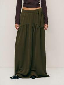 Nöista 深橄榄绿色长裙，垂坠感极佳，侧边系带设计凸显腰线；优雅百搭的冬季单品，无论是精致的圣诞聚会、隆重的新年造型，还是打造时尚现代冬季衣橱中的日常装扮，都是完美之选。 - 軍綠色 - 查看 4