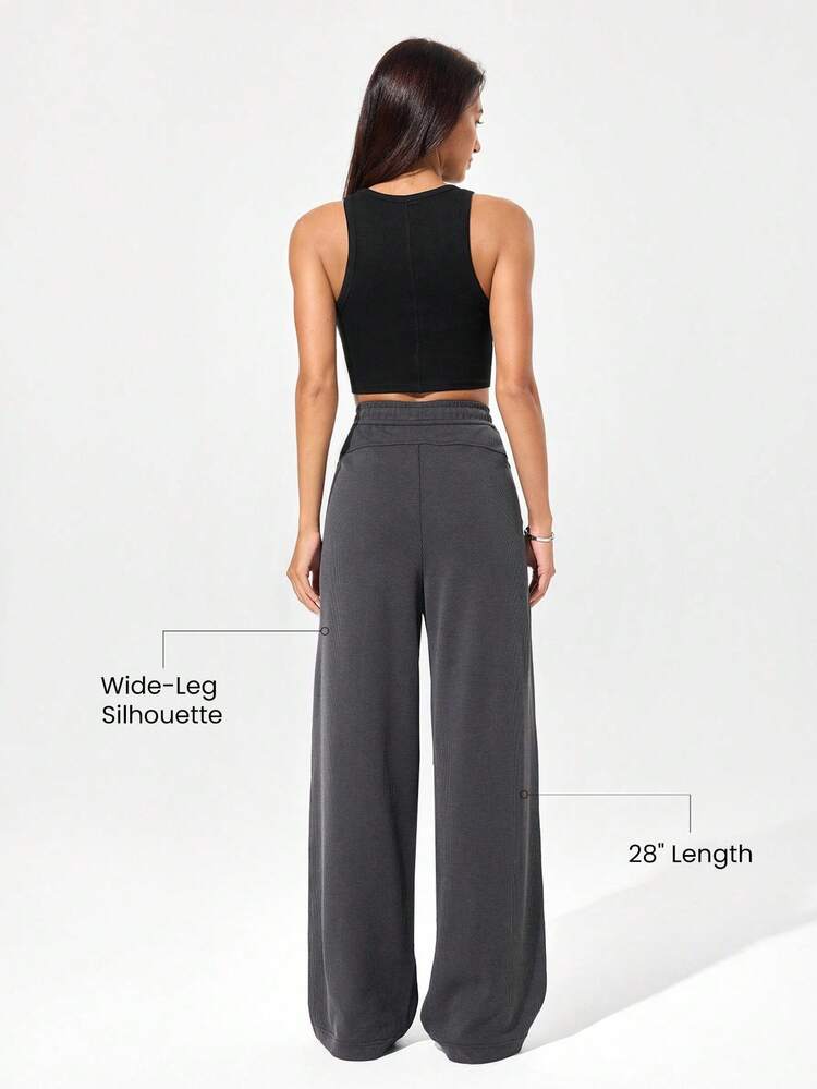 Pantaloni attivi con vita regolabile con laccetto, a gamba ampia, a coste in modal, con tasche laterali, per uso casual quotidiano