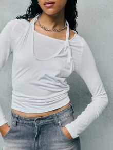 TypaGal Le Top à manches longues avec encolure torsadée en blanc est une version moderne des hauts d'automne, des tenues de cérémonie et des vêtements d'hiver. L'encolure unique convient aussi bien pour le style casual chic que pour les fêtes, y compris les vêtements de Noël. - Blanc - Voir 6
