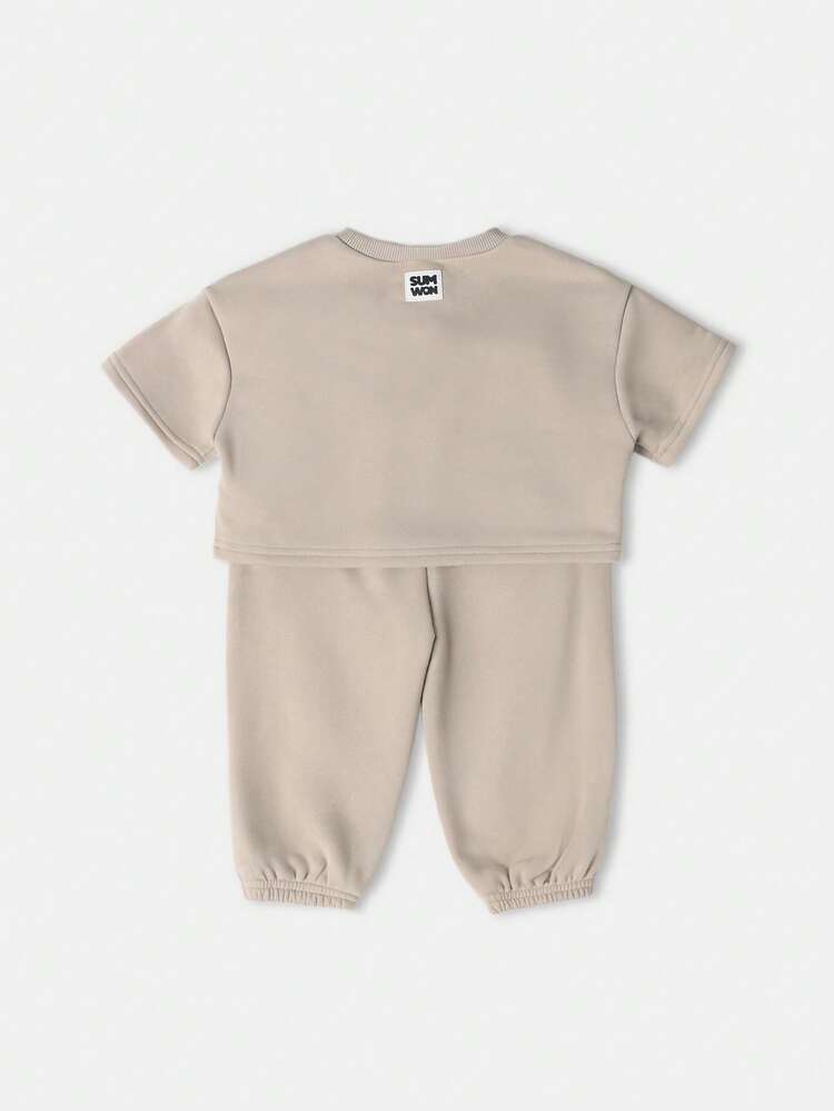 Bluza z logo motyla i elastycznymi spodniami typu jogger