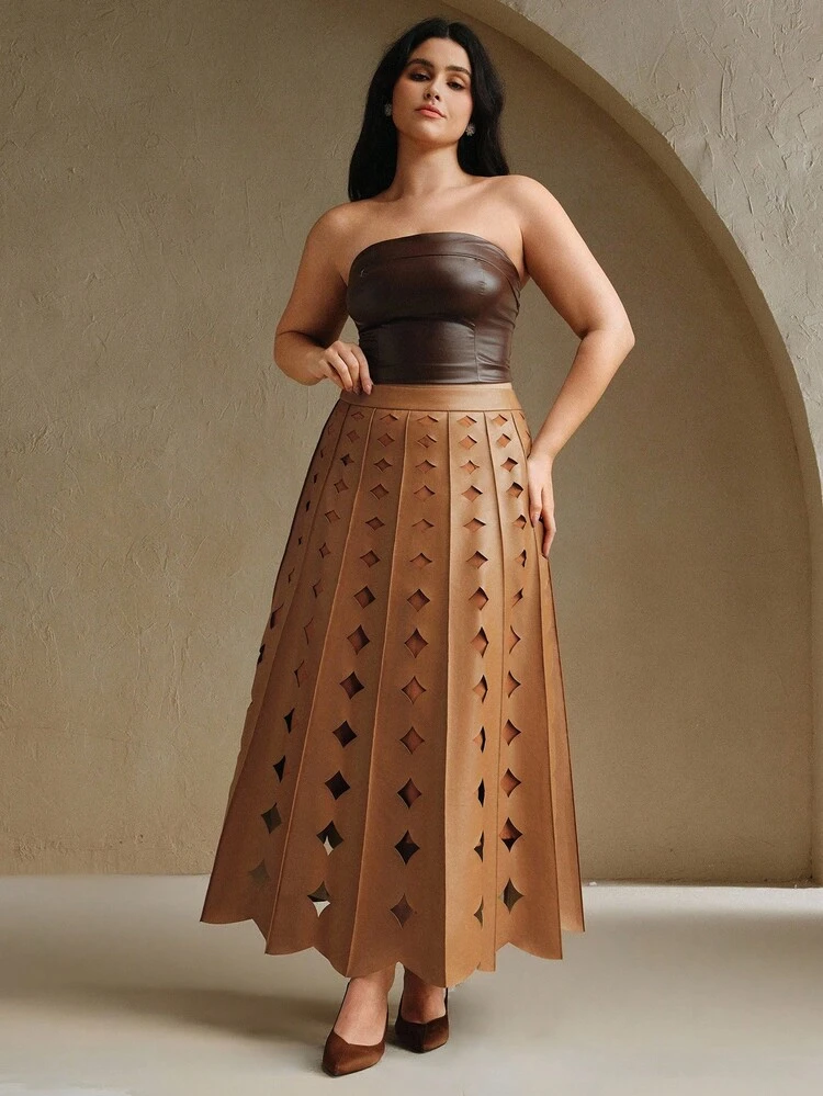 Jupes en cuir PU marron clair amples à ourlet en A, de couleur unie, avec motif de fleur brûlée prismatique, élégantes et à la mode pour le travail et les déplacements, pour femmes grandes tailles en automne et hiver