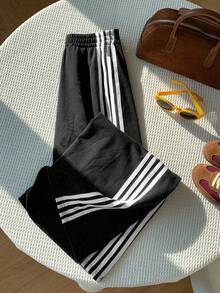 Comfortcana Quần nỉ ống rộng lưng thun kẻ sọc hai bên dành cho nữ, dáng rộng, thời trang thu đông - màu đen - Xem 6