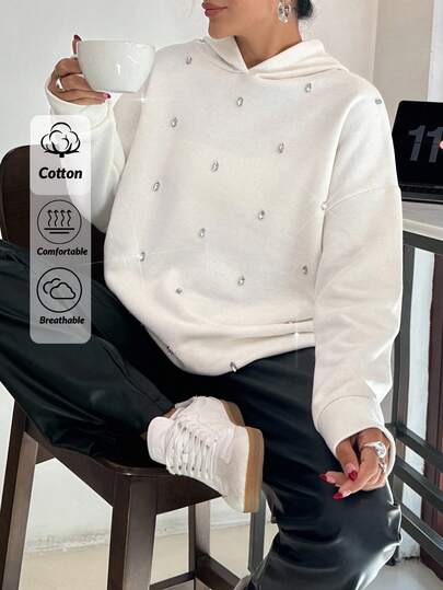 EURMUSE OVERSIZE EMBROIDERY SWEATSHIRT WITH STONE DETAIL