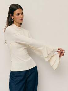Nöista Ivory Fitted Top With A Mock Neck And Flared Tiered Cuffs. Clean, Romantic Silhouette Suited For Fall And Winter Dressing, Holiday Parties, And Dressed-Up Going Out. - White - View 6