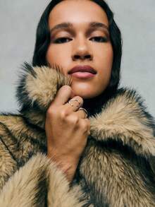 TypaGal Stand Out In Style With This Ash Brown Faux Fur Zip-Up Jacket, A Bold Option For Winter Jacket, Winter Coat, And Winter Clothes Women. Its Boxy, Modern Shape Is Ideal For Autumn Clothes And Perfectly Complements Fall Outfits For Women And Work Clothes Women. The Zip Detail Is A Nod To Button Up Shirt Women And Y2k Outfit Elements, While The Natural-Toned Fur Draws In Animal Print And Fairycore Influence For Alt And Goth Layering.