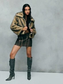 TypaGal Stand Out In Style With This Ash Brown Faux Fur Zip-Up Jacket, A Bold Option For Winter Jacket, Winter Coat, And Winter Clothes Women. Its Boxy, Modern Shape Is Ideal For Autumn Clothes And Perfectly Complements Fall Outfits For Women And Work Clothes Women. The Zip Detail Is A Nod To Button Up Shirt Women And Y2k Outfit Elements, While The Natural-Toned Fur Draws In Animal Print And Fairycore Influence For Alt And Goth Layering.