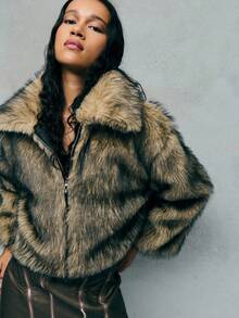 TypaGal Stand Out In Style With This Ash Brown Faux Fur Zip-Up Jacket, A Bold Option For Winter Jacket, Winter Coat, And Winter Clothes Women. Its Boxy, Modern Shape Is Ideal For Autumn Clothes And Perfectly Complements Fall Outfits For Women And Work Clothes Women. The Zip Detail Is A Nod To Button Up Shirt Women And Y2k Outfit Elements, While The Natural-Toned Fur Draws In Animal Print And Fairycore Influence For Alt And Goth Layering.