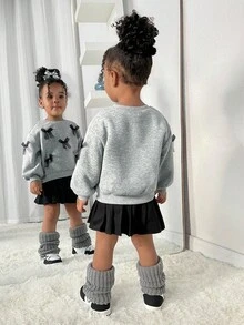 SHEIN Babygir Fashion Design Cute And Elegant Lady Baby Girl Adorable Knitted 2-Piece Set, Featuring A Long-Sleeve Sweatshirt With 3D Bow Decoration And An Elastic Waist Skirt, 2 Pieces In Total. Bow Sweatshirt, Black Pleated Skirt, Autumn And Winter Style Suitable For Indoors And Outdoors, Warm And Fashionable, Simple Style, Suitable For Indoor, Outdoor, Daily Wear, Sports, Playtime, Parties, Photoshoots, Vacations, And Festive Occasions. - Multicolor - View 5