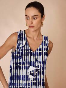 Shutterstock Glamance 女士优雅荷叶边无袖宽松衬衫，春夏蓝白上衣无袖荷叶边上衣女士夏季上衣飘逸上衣 - 藍色 - 查看 4