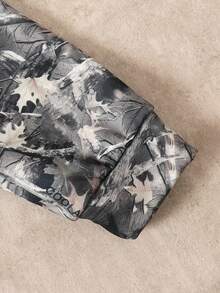 SHEIN بلوزة رياضية كاجوال فضفاضة للمراهقات بطبعة كاموفلاج أشجار وأغصان وطباعة شارع مع كابوشون