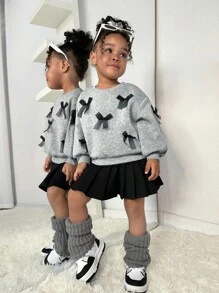 SHEIN Babygir Fashion Design Cute And Elegant Lady Baby Girl Adorable Knitted 2-Piece Set, Featuring A Long-Sleeve Sweatshirt With 3D Bow Decoration And An Elastic Waist Skirt, 2 Pieces In Total. Bow Sweatshirt, Black Pleated Skirt, Autumn And Winter Style Suitable For Indoors And Outdoors, Warm And Fashionable, Simple Style, Suitable For Indoor, Outdoor, Daily Wear, Sports, Playtime, Parties, Photoshoots, Vacations, And Festive Occasions. - Multicolor - View 1