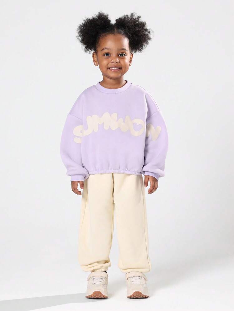 Oversized Bubble Style Sweatshirt With Cinched Hem And Heart Design