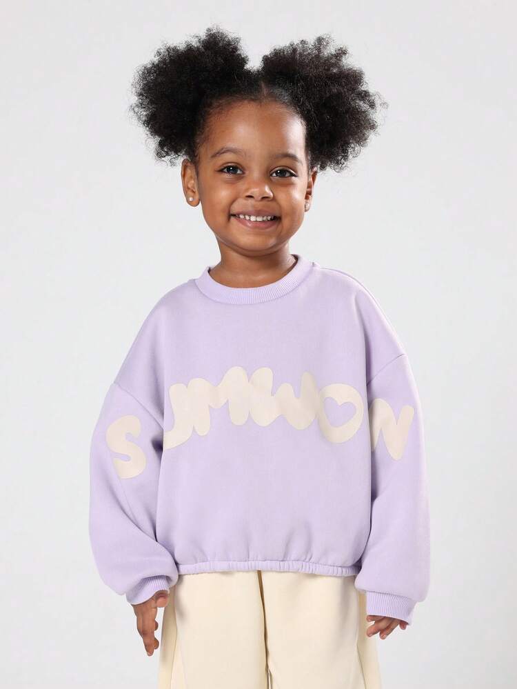 Oversized Bubble Style Sweatshirt With Cinched Hem And Heart Design