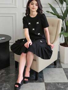 SHEIN 1 件 Tween Girl 纯色 3D 蝴蝶结短袖褶皱摆裙，宽松版型，春夏 - 黑色 - 查看 4