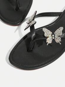 CUCCOO TILAWA Sandalias planas de mujer con decoración de mariposa de PU negro y rhinestones, versátiles para uso casual, ocio, vacaciones y playa