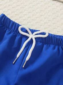 SHEIN Streecool Kids 2pcs/Set Young Boys Casual Letter Print Round Neck Short Sleeve T-Shirt And Loose Shorts Set, Slogan Print, Color Block Design, Suitable For Spring/Autumn, Sports, Casual, Daily Wear, Travel, School And Outdoor Activities - Blue and White - View 7