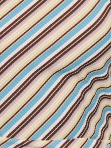 Nöista 条纹单肩系腰上衣，柔软罗纹针织，斜纹奶油色、棕色和淡蓝色条纹，不对称领口和单肩设计，打造现代俏皮廓形，腰部系带勾勒出优美身形，与高腰下装相得益彰。秋季和假日造型的完美之选——在圣诞派对上，可内搭皮夹克或定制西装外套。 - 彩色 - 查看 6