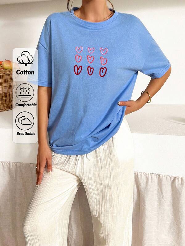 SHEIN Camiseta casual de manga corta para mujer con bordado de corazón colorido, corte holgado y relajado, color liso