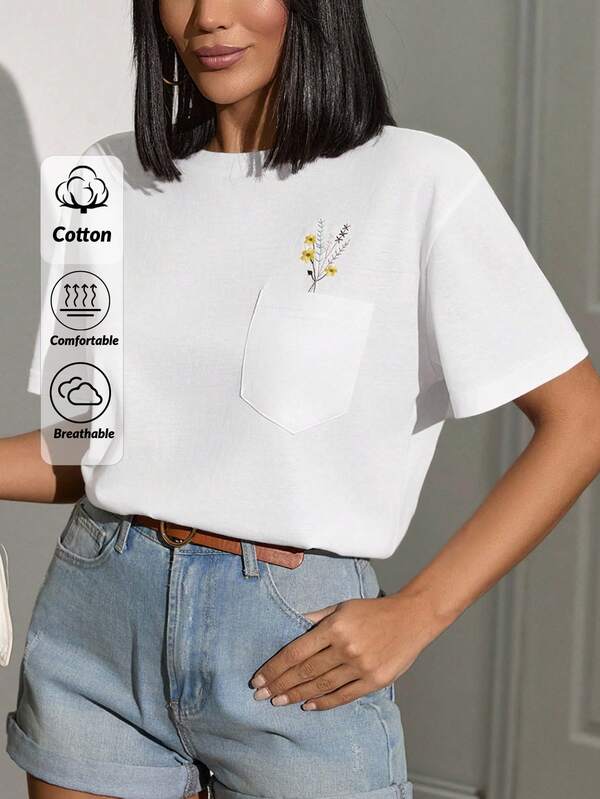 EURMUSE Blouse met geborduurde zakken – Minimalistisch wit ontwerp met delicate bloemenborduursels op de voorzak