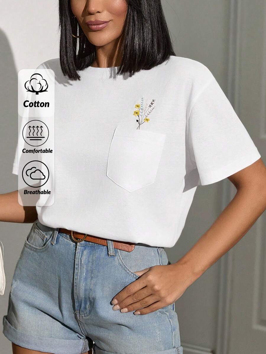 EURMUSE Broderad fickblus – minimalistisk vit design med delikat blombroderi på framfickan - Vitt - Visa 1