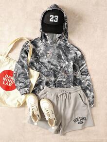 SHEIN بلوزة رياضية كاجوال فضفاضة للمراهقات بطبعة كاموفلاج أشجار وأغصان وطباعة شارع مع كابوشون