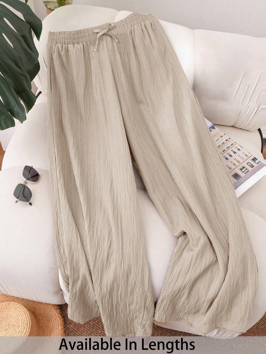 SHEIN Tween Girls' Casual Solid Lotus Root Pink Textured Fabric Drawstring Bow Palazzo Pants Wide Leg Linen Pants Wide Leg Pants Loose Pants Baggy Pants Girl Wide Leg Pants Khaki Girl Pants Khaki Pants Pants Baggy Teen Fall Winter - Apricot - View 1