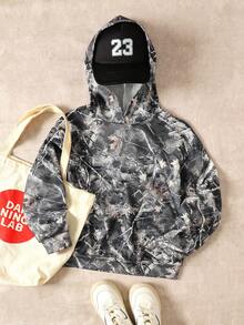 SHEIN بلوزة رياضية كاجوال فضفاضة للمراهقات بطبعة كاموفلاج أشجار وأغصان وطباعة شارع مع كابوشون