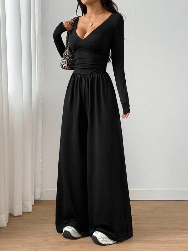 Flirla Women's V-Neck Solid Color Fitted Long Sleeve Pleated Jumpsuit