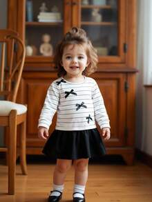 SHEIN Baby Girls' 3D Bow Decor Long Sleeve Sweatshirt. The 3D Bow Design Adds Endless Childlike Charm. Round Neck Style, Simple And Fashionable, Suitable For Outdoor Play, Home Leisure, Party Attendance And Various Occasions, Making The Baby The Little Focus In The Crowd And Displaying Lively And Adorable. - Black and White - View 10