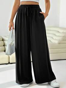 Solflare Pantaloni larghi casual in nero, con tasche e vita con cordino, in taglia comoda