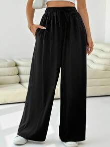 Solflare Pantaloni larghi casual in nero, con tasche e vita con cordino, in taglia comoda