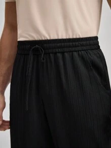 Officeau بنطلون كاجوال رجالي سادة بخصر مطاطي، عملة قديمة