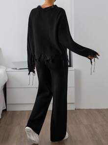 EURMUSE Due pezzi di set lavorato a maglia consumato, con maglione a spalle scoperte con orlo sfilacciato e pantaloni a zampa larga con costine in nero - nero - Visualizzare 6