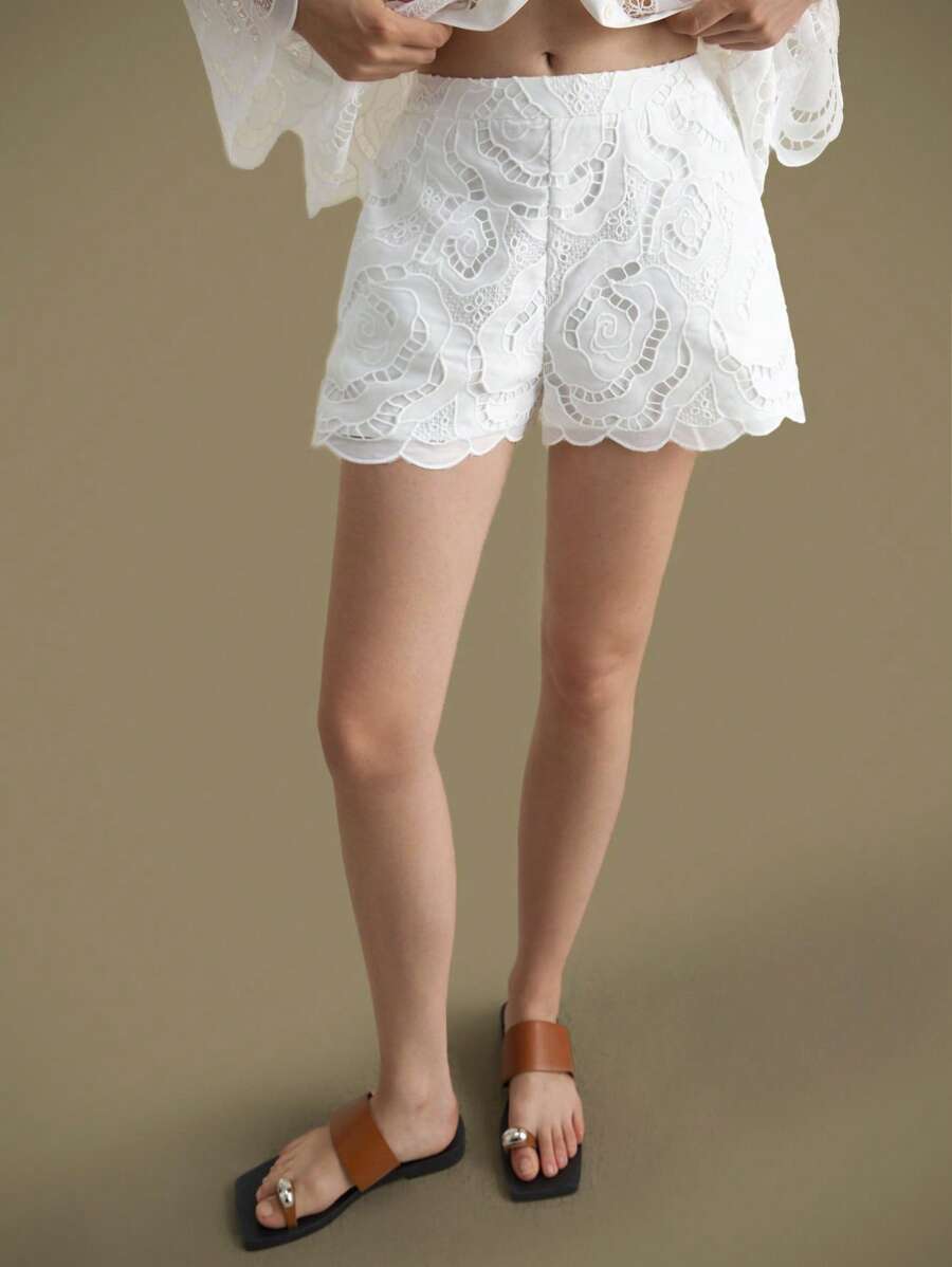 Ontre شورت نسائي عصري بتطريز مفرغ ذو لون أحادي، أنيق وذكي لضيوف حفلات الزفاف، بأسلوب فرنسي مرتخي ذو إحساس بالذكاء والأناقة، بأسلوب المال القديم، ملابس مناسبة للرحلات والعطلات في جميع المواسم، أزياء عصرية متنقلة وعشوائية، متعددة الاستخدامات للنساء، بأسلوب الغرب والريف - لون مشمشي - مشاهدة 1