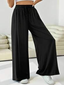 Solflare Pantaloni larghi casual in nero, con tasche e vita con cordino, in taglia comoda