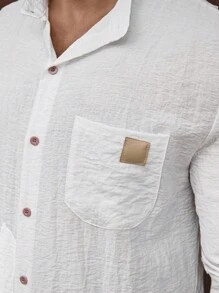 Manfinity Homme Camisa de manga larga con botones delanteros y bolsillo, unicolor casual para hombres, camisa de lino blanca para hombres en otoño