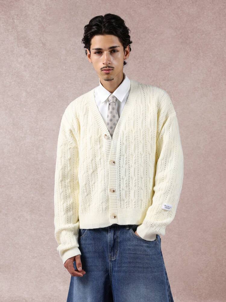 Cardigan boutonné en maille torsadée avec col à revers