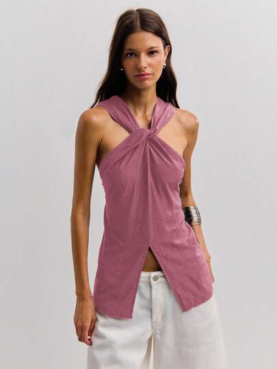 Nöista 结饰露背上衣，前领口扭褶，前开衩。无袖修身剪裁，灵感源自Y2K。百搭百搭，是秋季女装、秋季服装、女士外出上衣、女士演唱会服装以及商务休闲女装的理想之选。是夜间外出、性感夜店装以及返校季的完美之选。