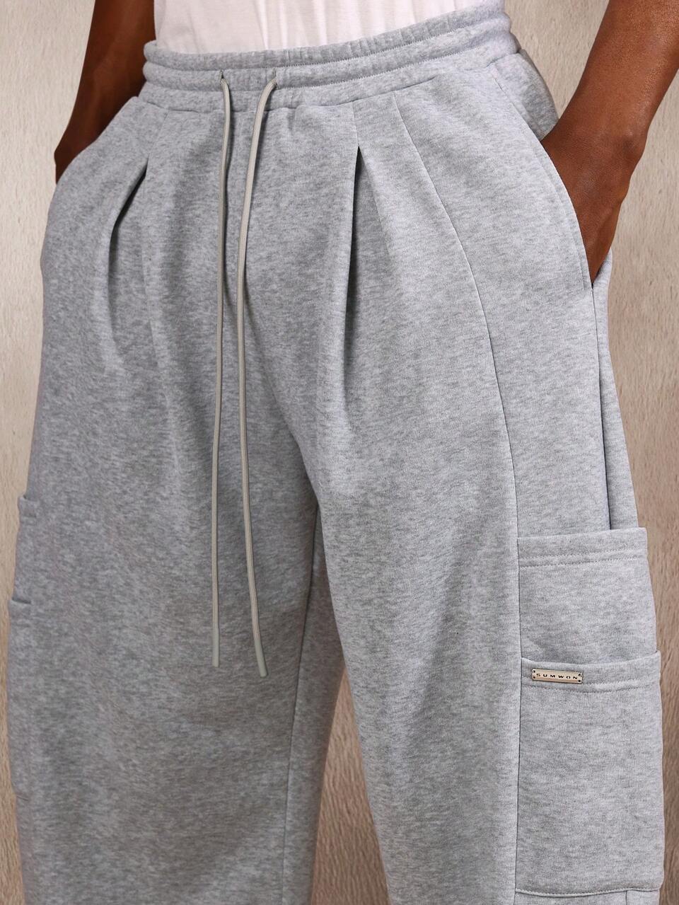 SUMWON Loose Fit Pleated Sweatpants With Layered Side Pockets Plain